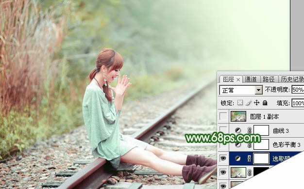Photoshop为坐在铁轨的美女加上甜美的淡调粉绿色