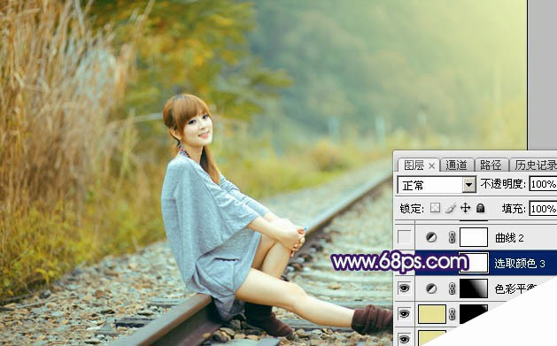 Photoshop调制出淡黄色的秋季铁轨小清新美女图片