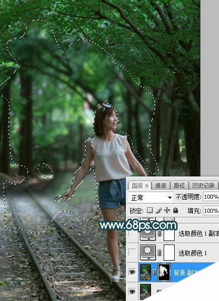 Photoshop为树林人物图片打造梦幻的暗青色逆光效果